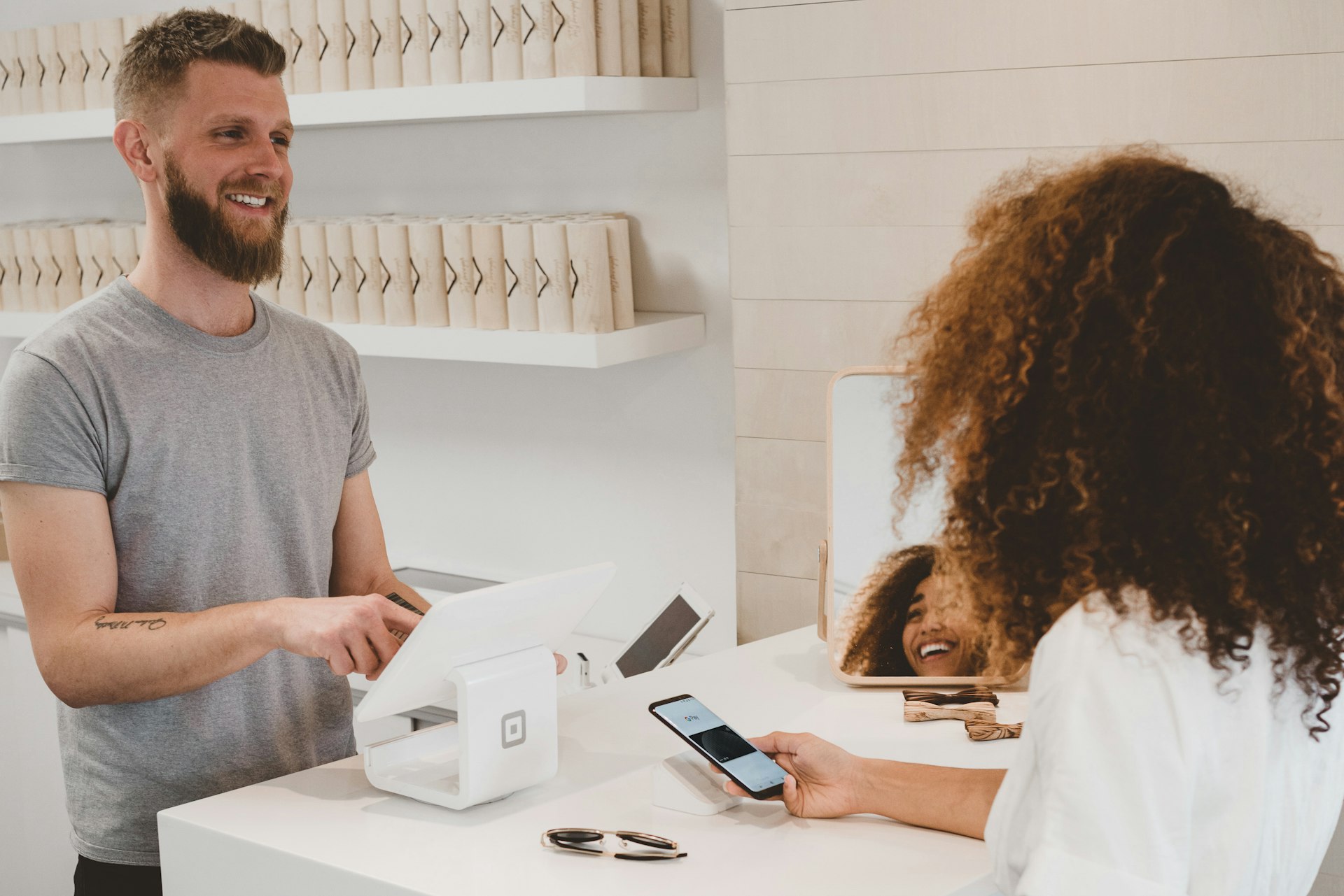 Credit card and laptop showing a checkout interface for online payments